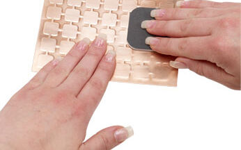 Sanding metal sheet with a sanding pad